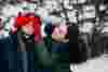 couple-together-winter-park-having-fun